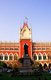 The Calcutta High Court (it retains the old name as it is an institution) was built in a neo-Gothic style in 1872, by the architect Walter Granville.<br/><br/>

The tax records of Mughal Emperor Akbar (1584–1598) as well as the work of a 15th century Bengali poet, Bipradaas, both mention a settlement named Kalikata (thought to mean ‘Steps of Kali’ for the Hindu goddess Kali) from which the name Calcutta is believed to derive.<br/><br/>

In 1690 Job Charnock, an agent of the East India Company, founded the first modern settlement in this location. In 1698 the company purchased the three villages of Sutanuti, Kolikata and Gobindapur. In 1727 the Calcutta Municipal Corporation was formed and the city’s first mayor was appointed.<br/><br/>

In 1756 the Nawab of Bengal, Siraj ud-Daulah, seized Calcutta and renamed the city Alinagar. He lost control of the city within a year and Calcutta was transferred back to British control. In 1772 Calcutta became the capital of British India on the orders of Governor Warren Hastings.<br/><br/>

In 1912 the capital was transferred to New Delhi while Calcutta remained the capital of Bengal. Since independence and partition it has remained the capital and chief city of Indian West Bengal.